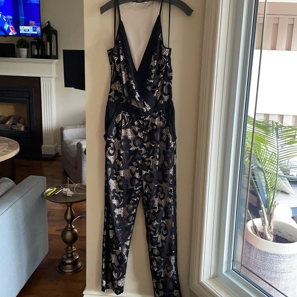 DVF SHANY BLACK LACE JUMPSUIT 6. Bought on Poshmark but it sadly does not fit. - Picture 6 of 12